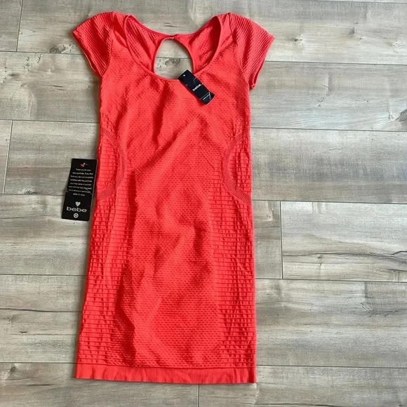 NWT Bebe Bodycon Orange Mini Dress Sz M/L - Picture 1 of 7